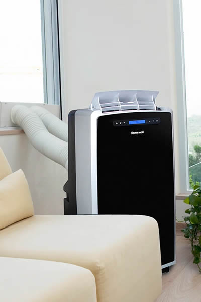 a self evaporating portable air conditioner